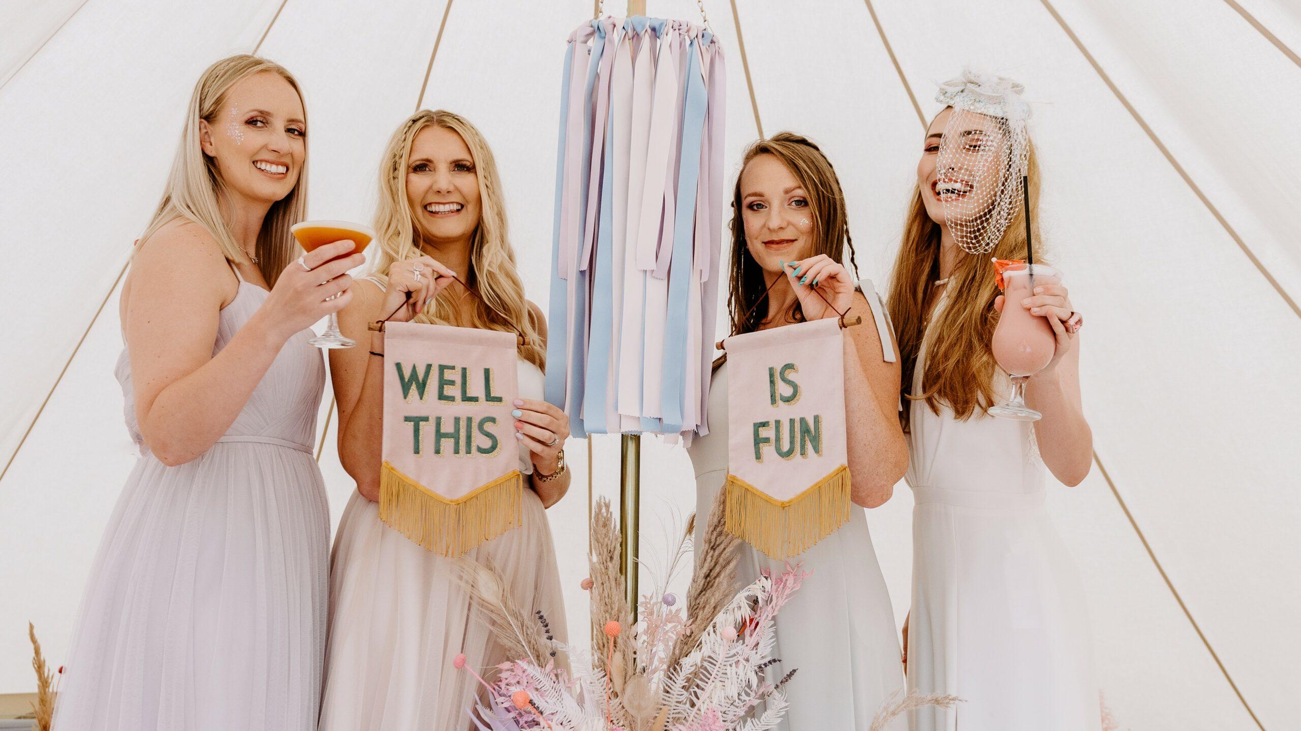 Image shows a Bride and her Bridesmaids on a wedding day.