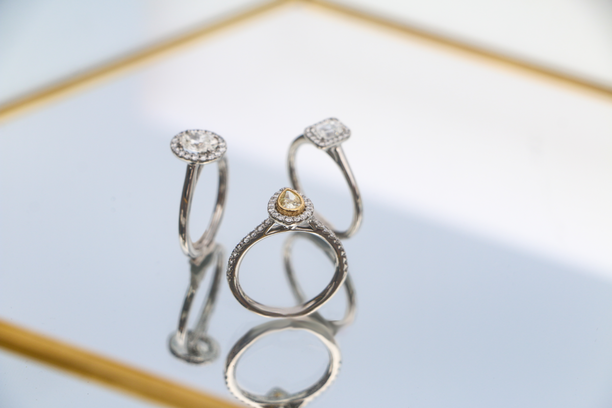 Image shows examples of diamond shapes/ Image shows 3 engagement rings, all with a different shaped diamond.